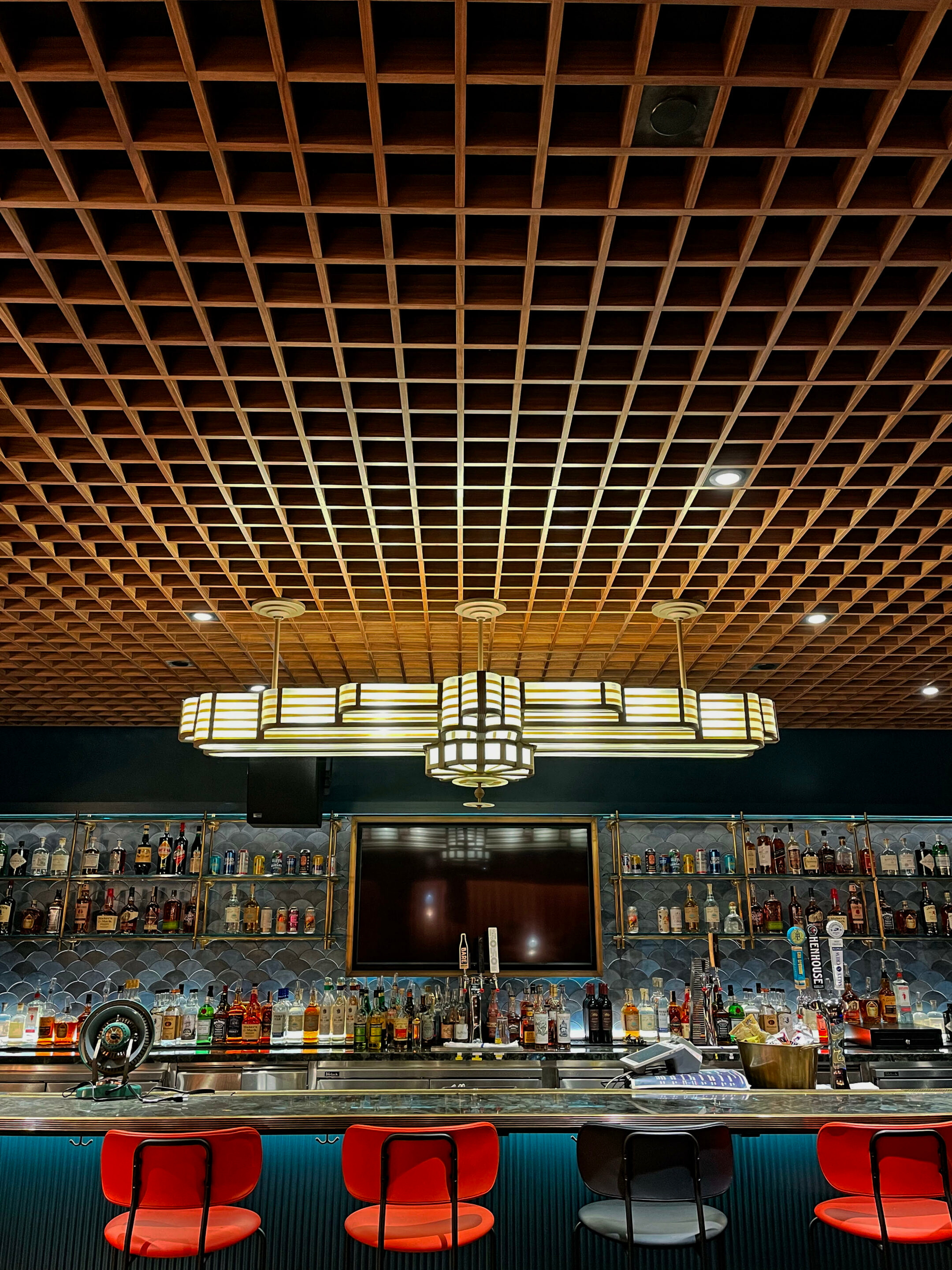 Bar Ceiling - Madrid’s Open Cell wood enhances the bar area at the Guild Theatre